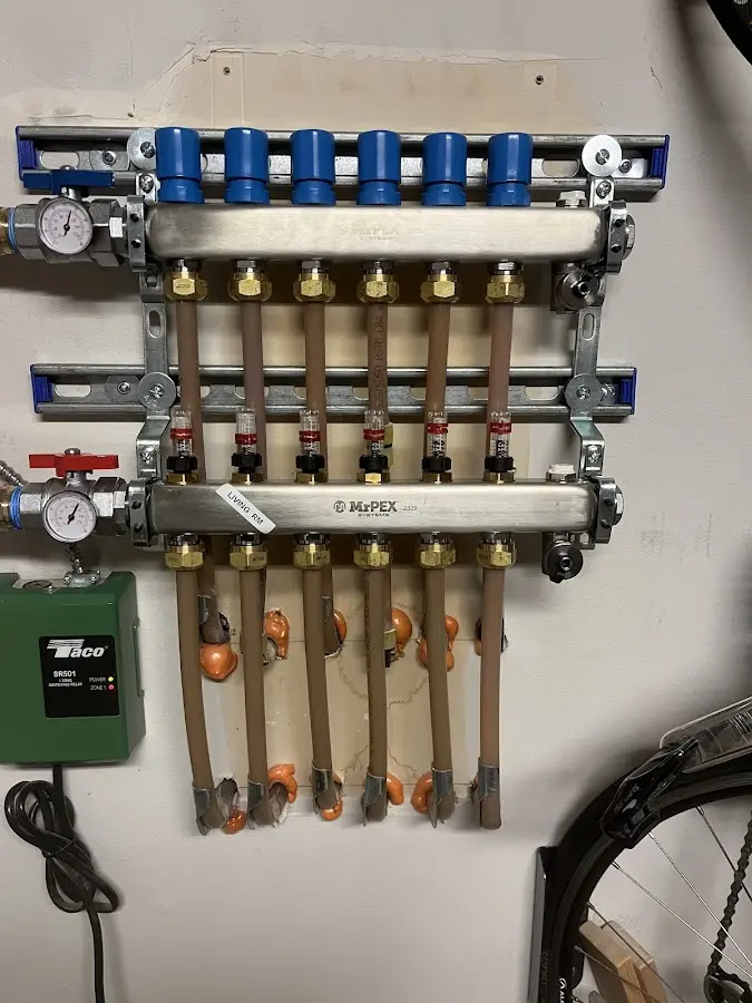 Plumber performing Water Heater Repair at a residential property in Snellville